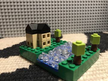 Microscale folyóparti mediterrán családiház.