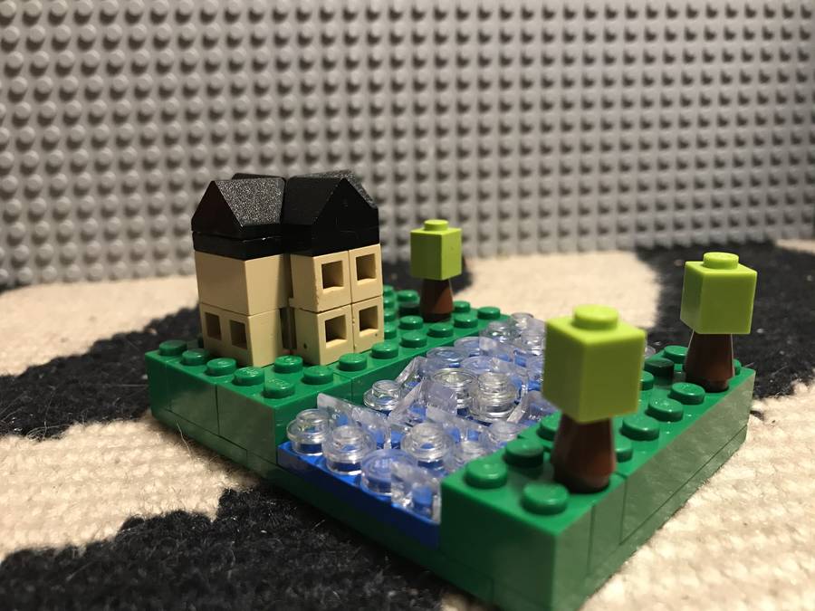 Microscale folyóparti mediterrán családiház.