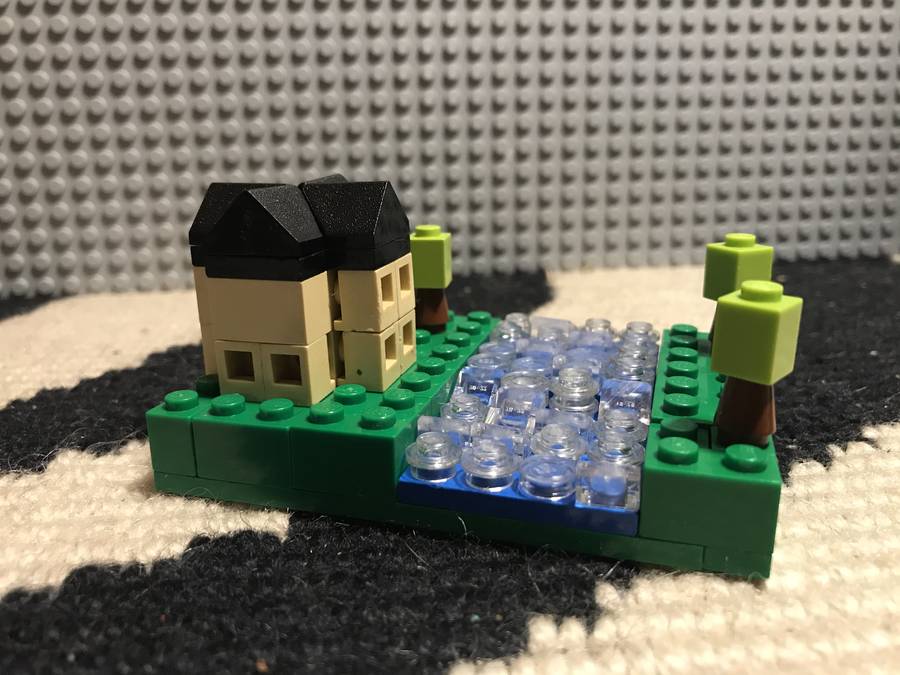 Microscale folyóparti mediterrán családiház.