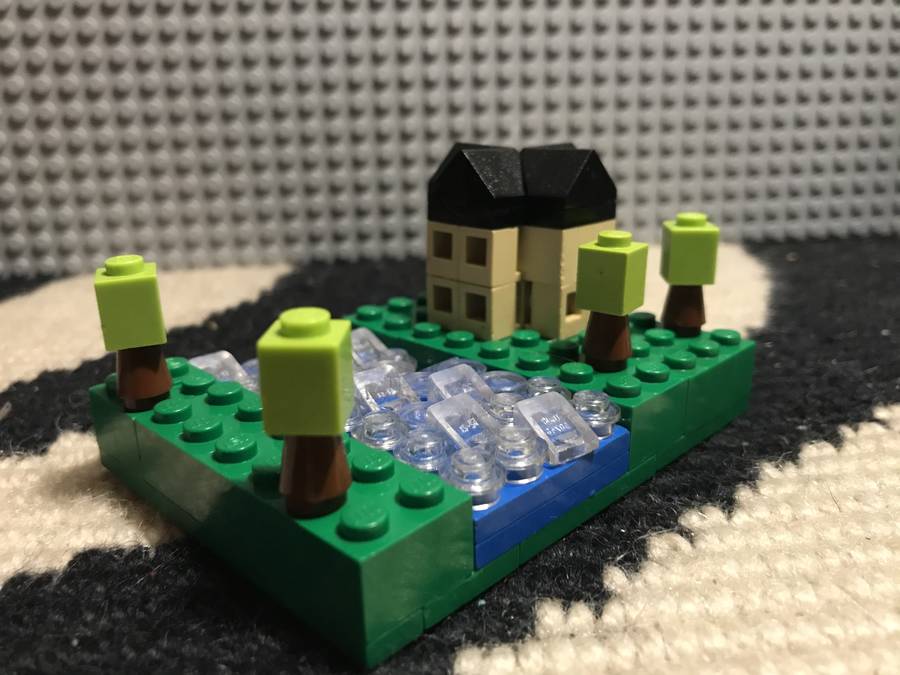 Microscale folyóparti mediterrán családiház.