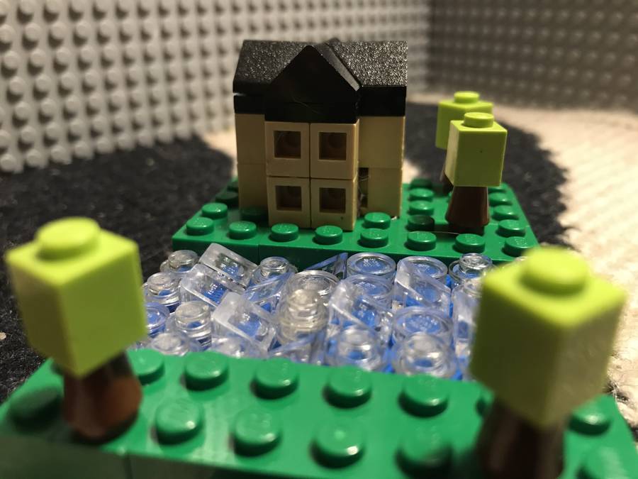 Microscale folyóparti mediterrán családiház.