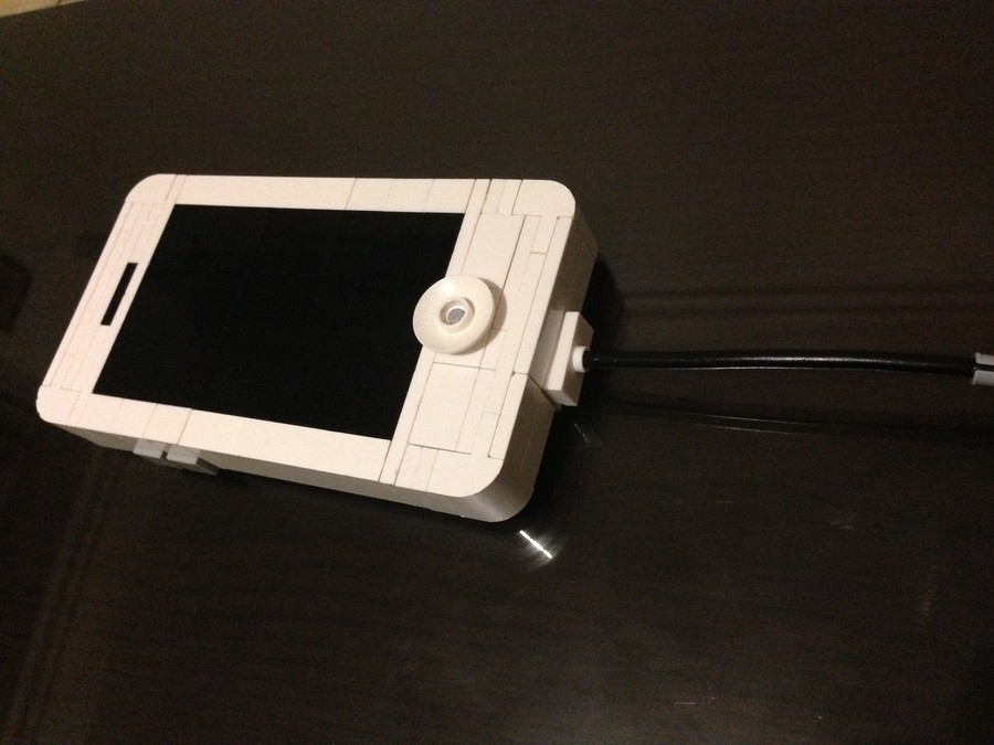 iPhone 4 töltővel és konnektorral