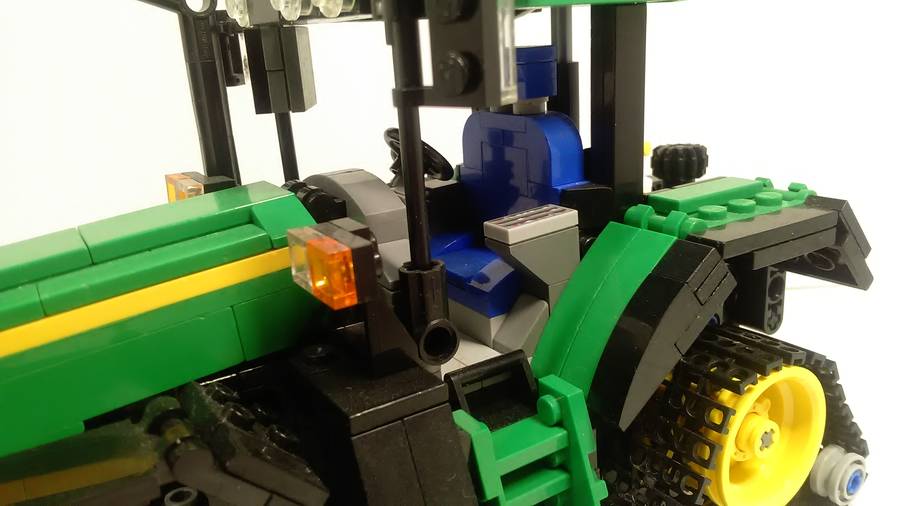 John Deere traktor vetőgéppel
