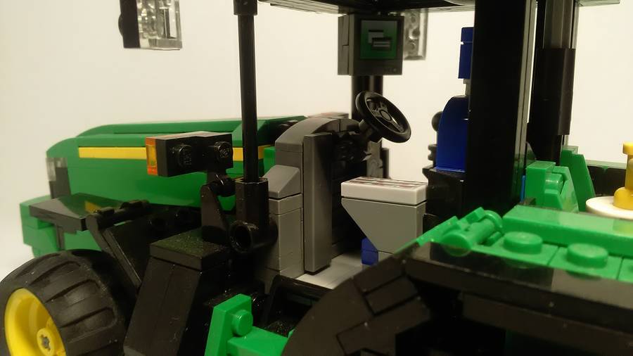 John Deere traktor vetőgéppel
