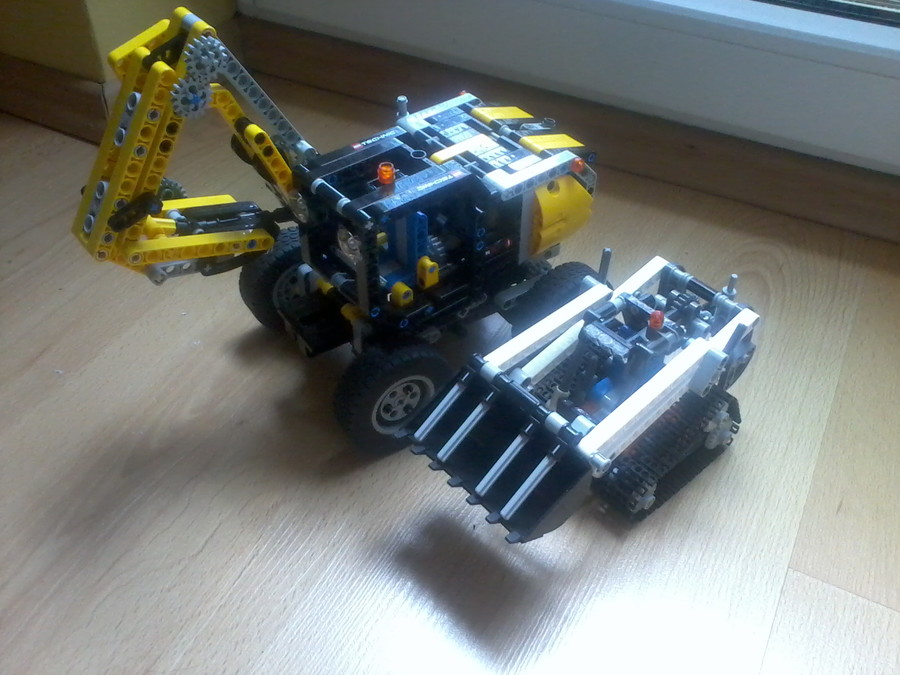légkalapáccsal felszerelt markoló